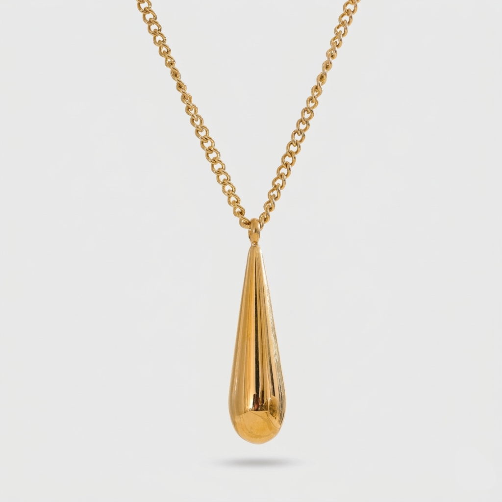 A flat 18ct gold plated medical steel snake chain necklace featuring a single polished gold ball pendant. High-shine finish, hypoallergenic and tarnish-proof.