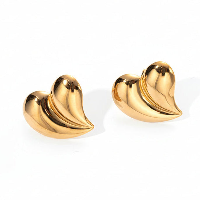 Gold banana-shaped earrings with measurements and weight details on a white background