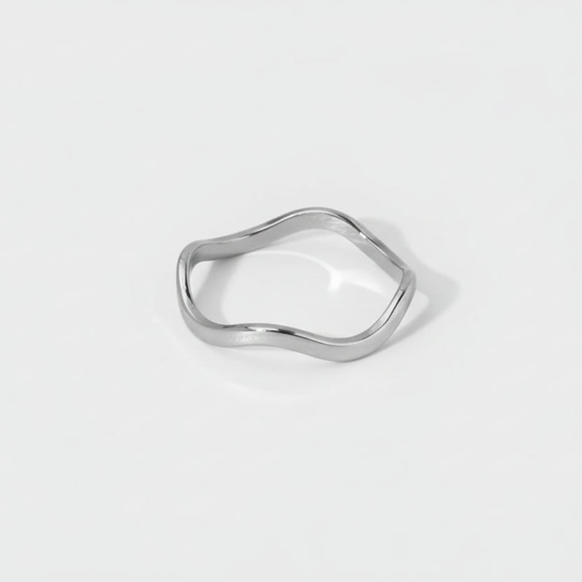 Elegant organic-shaped band crafted from tarnish-proof stainless steel. A versatile wavy ring perfect for a modern jewellery stack.